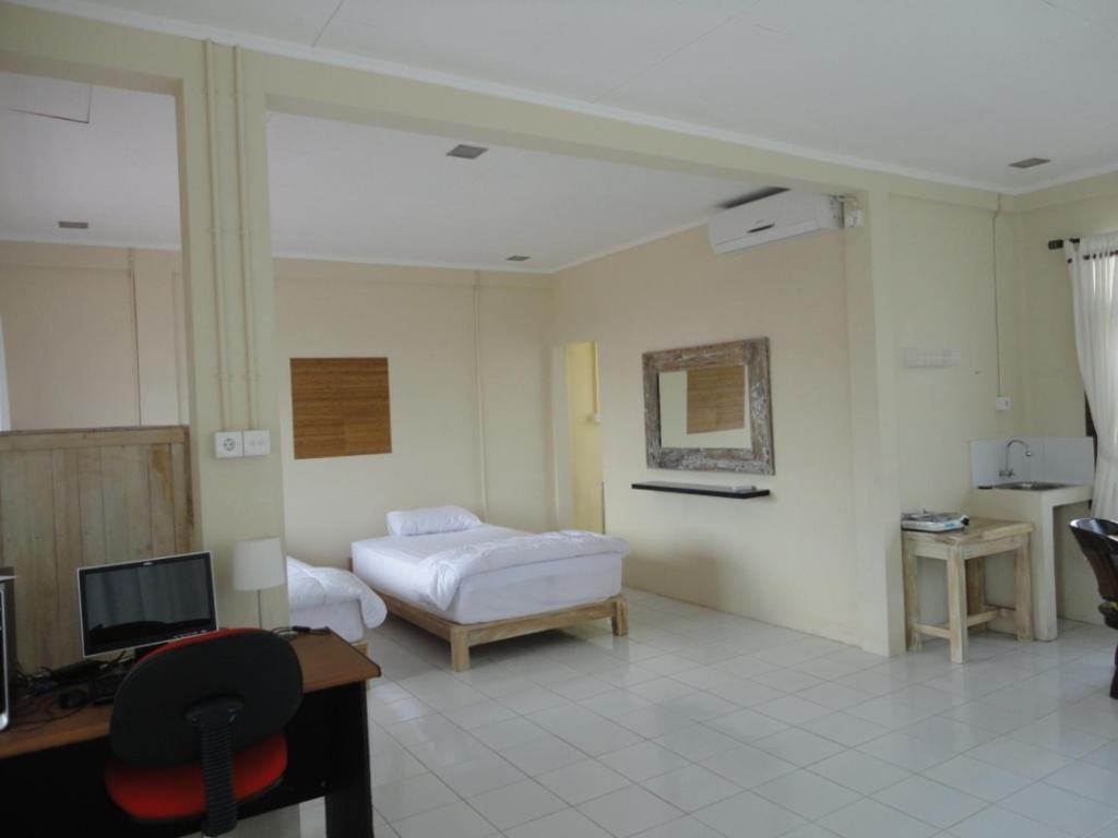 Urbanview Hotel Wayan Mansion 덴파사르 객실 사진